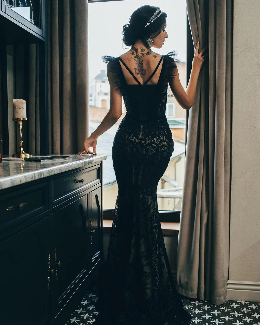 Black Couture Gown With Ruffled Shoulders